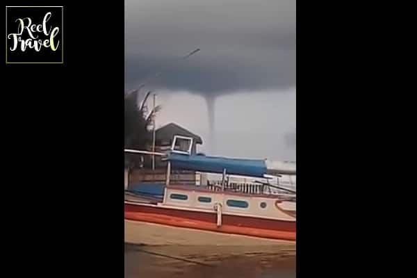 Водяной смерч и тропический шторм в Тихом океане Водяной смерч и тропический шторм в Тихом океане